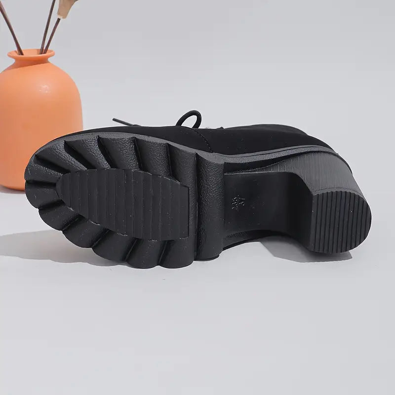 Stivaletti con tacco alto – Eleganza senza dolore