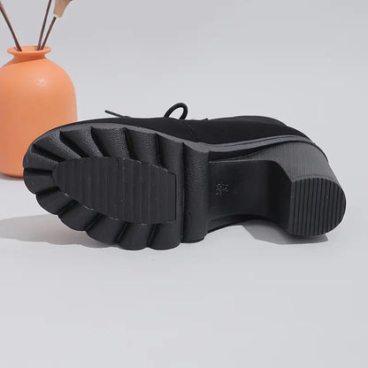 Stivaletti con tacco alto – Eleganza senza dolore